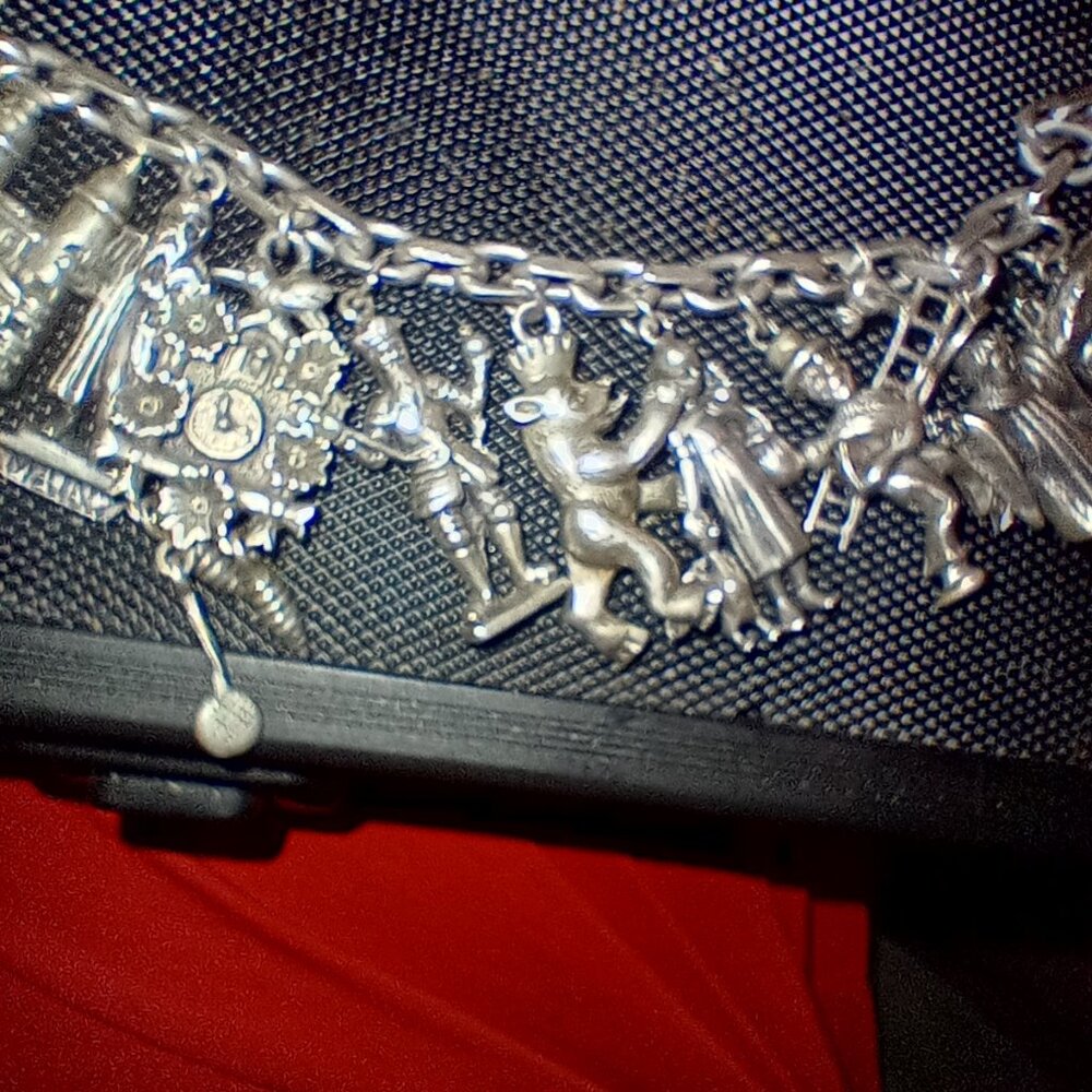 Fine silver charm bracelet